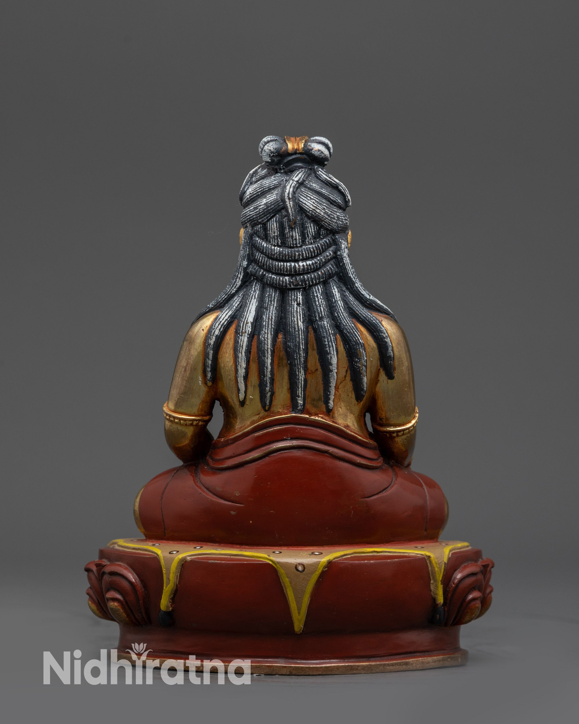 Back view of Thangtong Gyalpo Statue on oxidized copper lotus seat handmade in Nepal