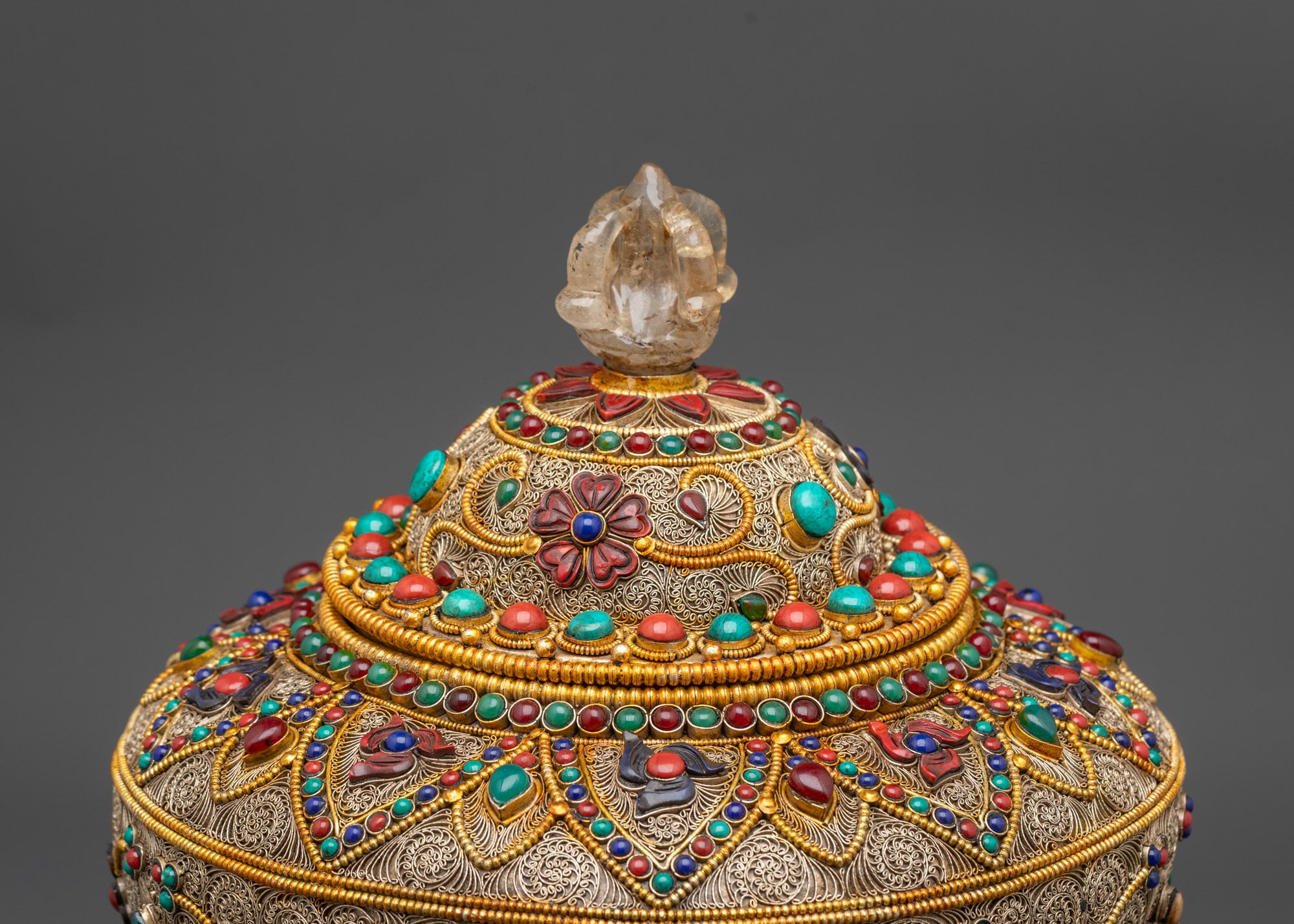 Back view of Tibetan Rice Pot crowned with crystal half-vajra handle for blessings & protection
