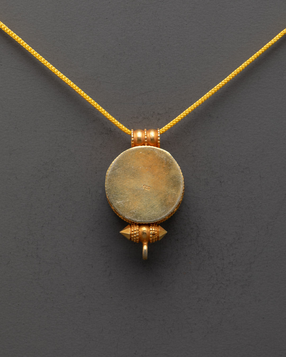 Back view of Tibetan Victory Banner Locket made by master artisans in Patan, Nepal