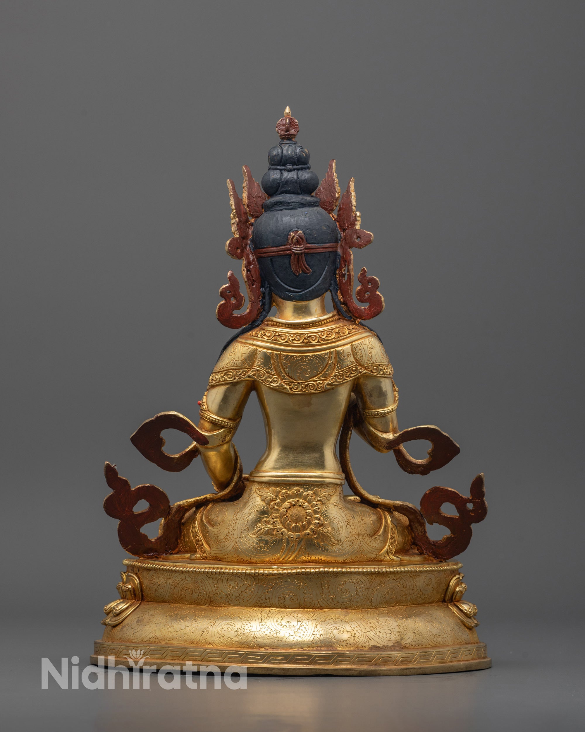 Back view of Traditional Nepalese Vajrasattva sculpture with gold finish