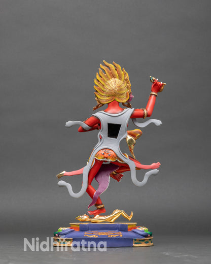 Back view of Troma Nagmo, copper sculpture with intricate lotus and painted details