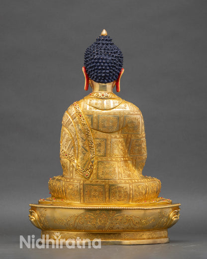 Back view of Vairocana Buddha sculpture revealing carved floral robe and lotus pedestal