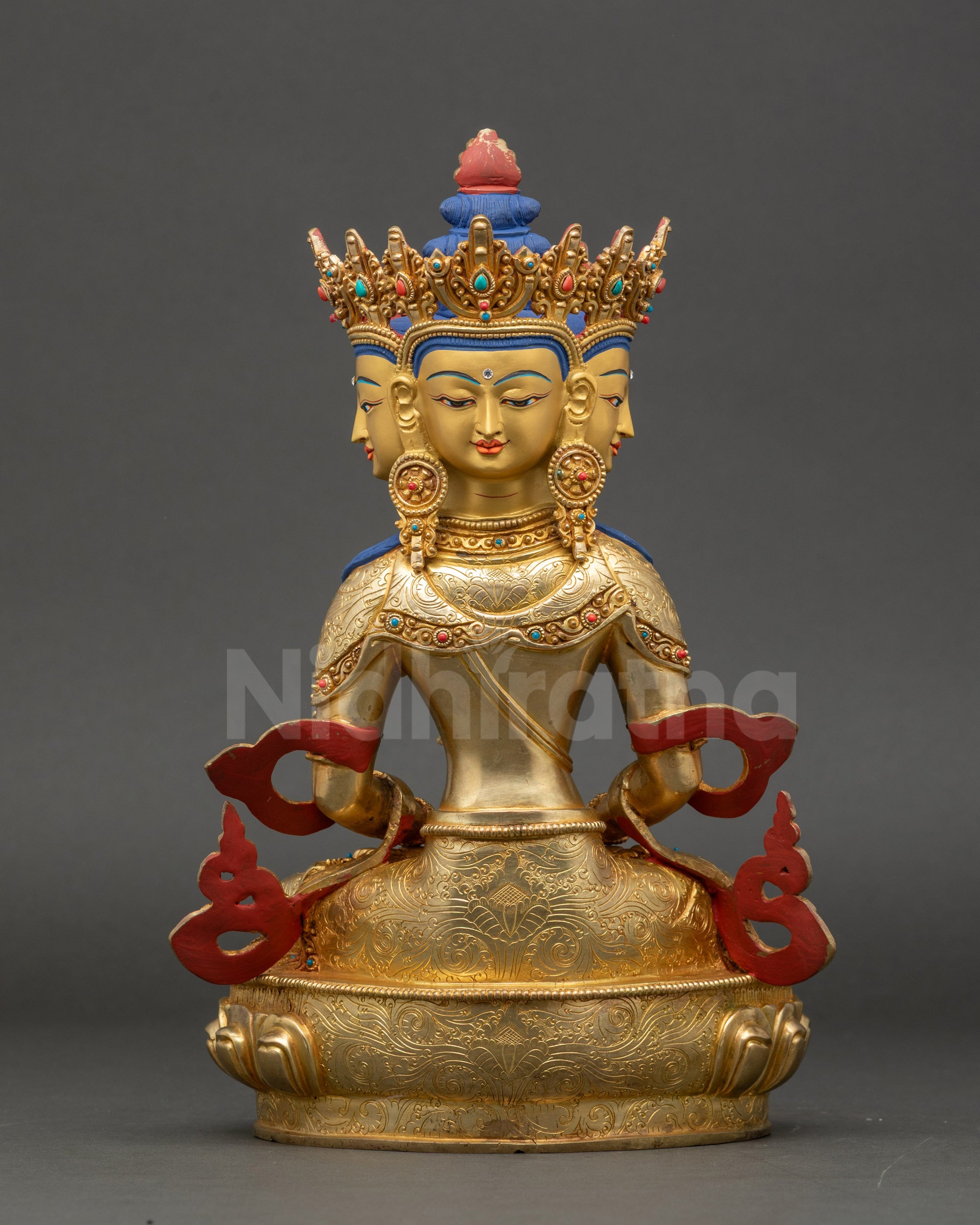 Back view of Vairocana Buddha sculpture showing intricately carved robe and motifs