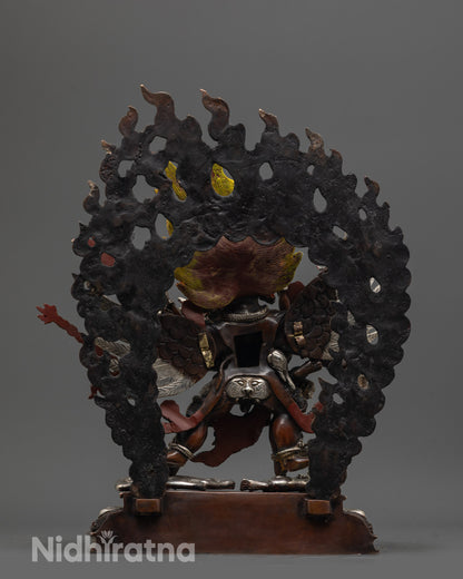 Back view of Vajrakilaya Statue featuring intricate carvings 
