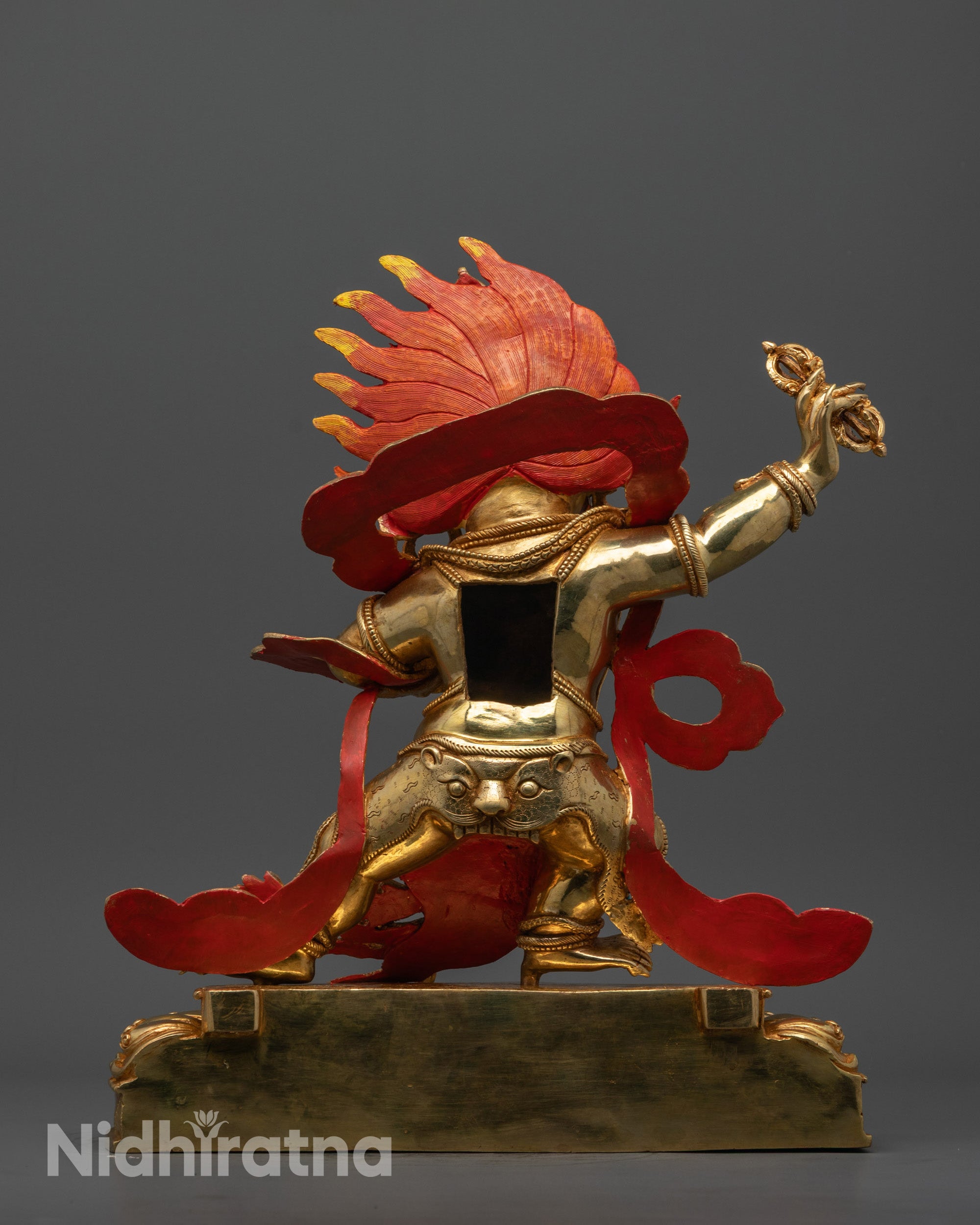 Back view of Vajrapani Statue highlighting detailed robe and fire-gilded finish on copper