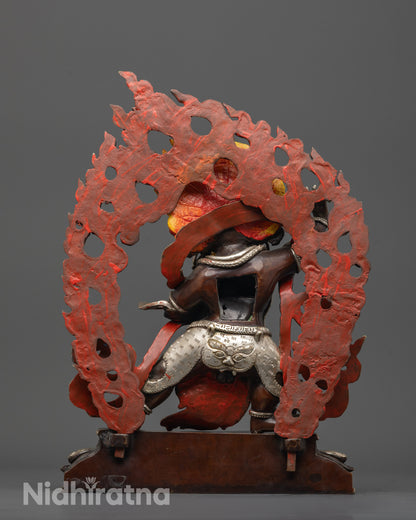 Back view of Vajrapani statue highlighting silver-plated fearful halo and tiger skin garment