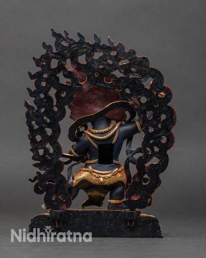 Back view of Vajrapani statue with intricate lotus base detailing