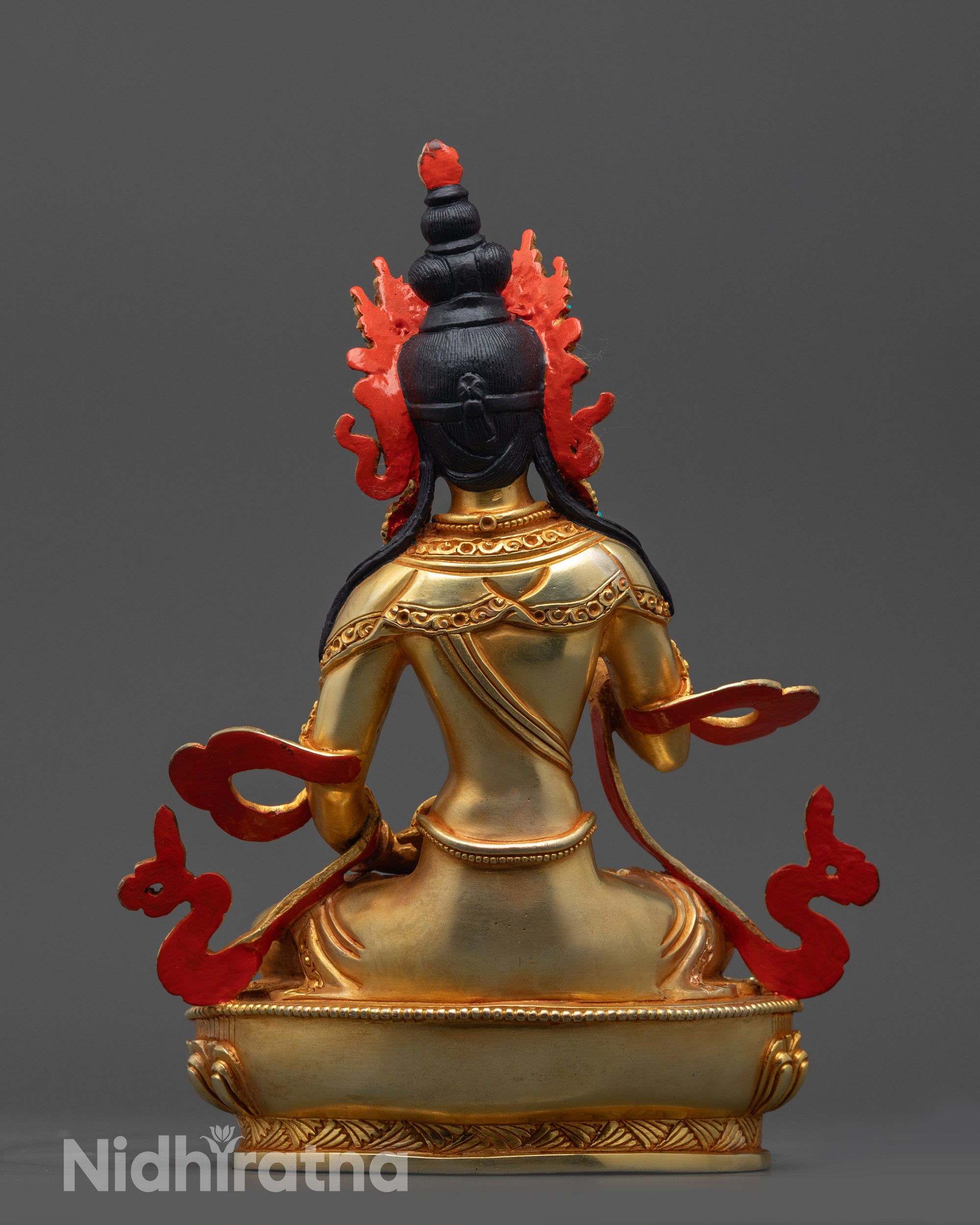 Back view of Vajrasattva Statue featuring detailed lotus seat patterns and gold fire-gilded body