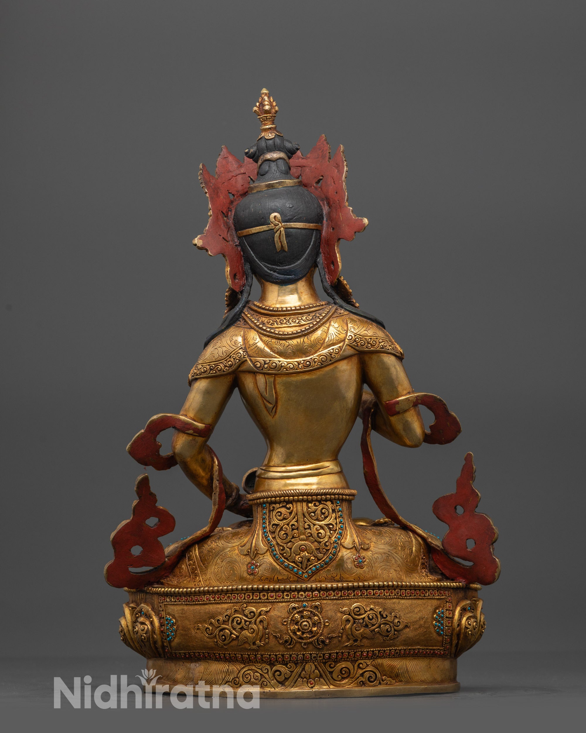 Back view of Vajrasattva Statue showing intricate wisdom wheel patterns and carvings