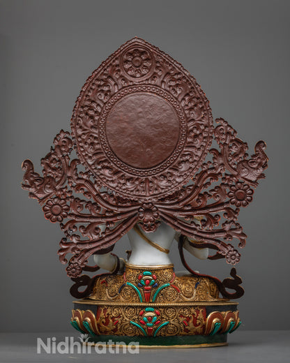 Back view of Vajrasattva Statue with halo adorned with flowers and semi-precious stones