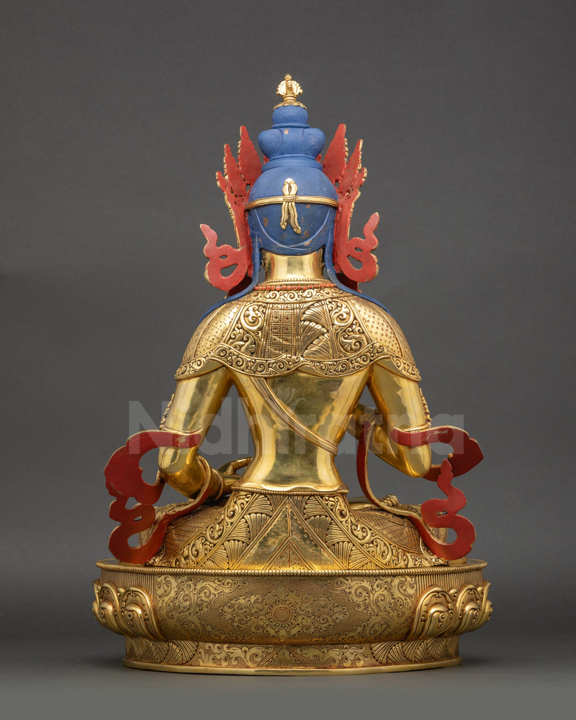 Back view of Vajrasattva statue flowing robe with semi precious stones lotus base