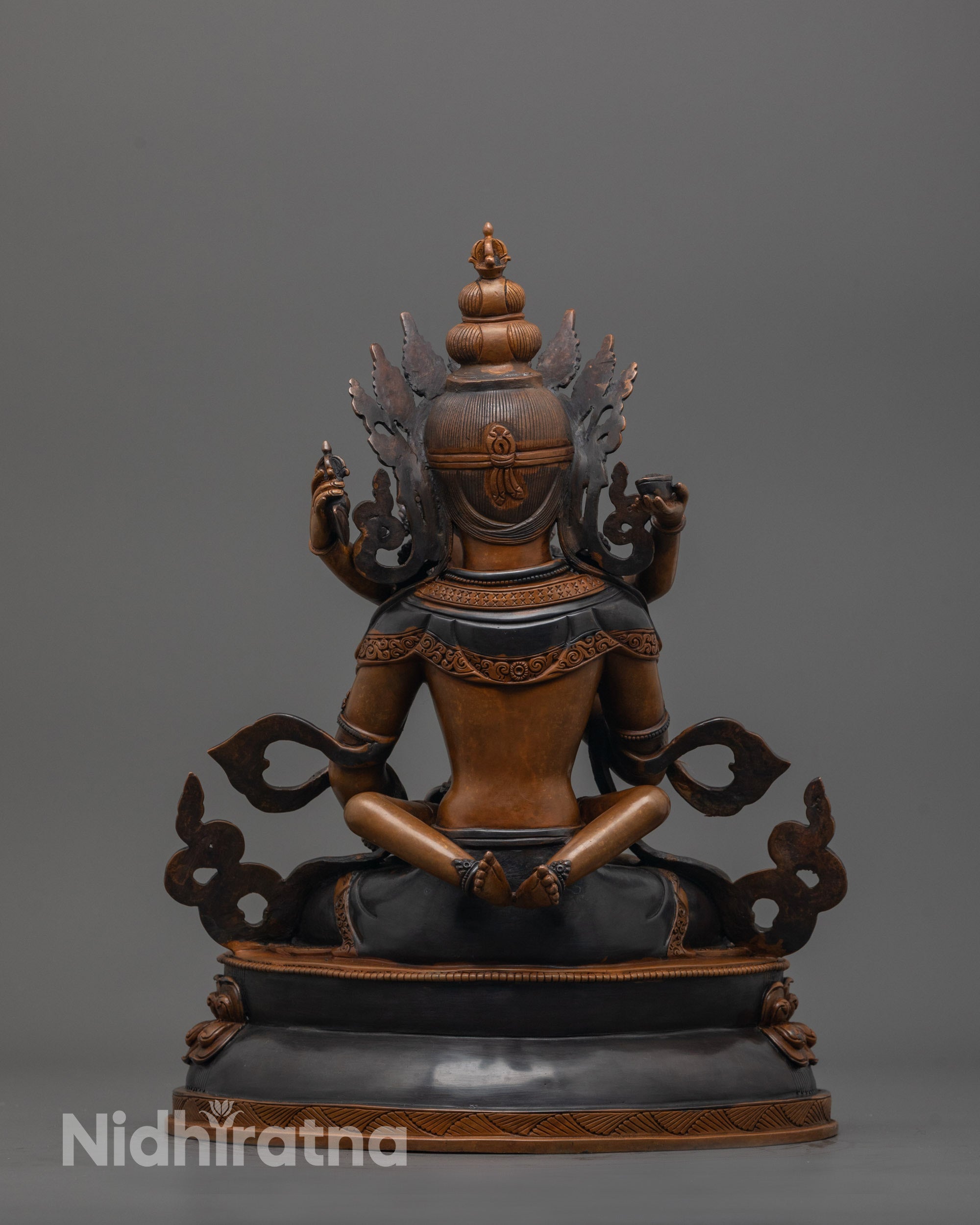 Back view of Vajrasattva statue highlighting deep patina and artisan lost-wax casting details