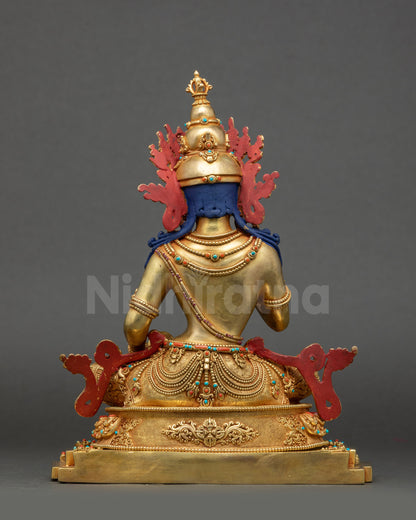 Back view of Vajrasattva statue showing five-jewelled crown and carved copper details