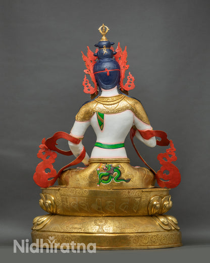 Back view of Vajrasattva statue showing layered lotus base and gilded detailing