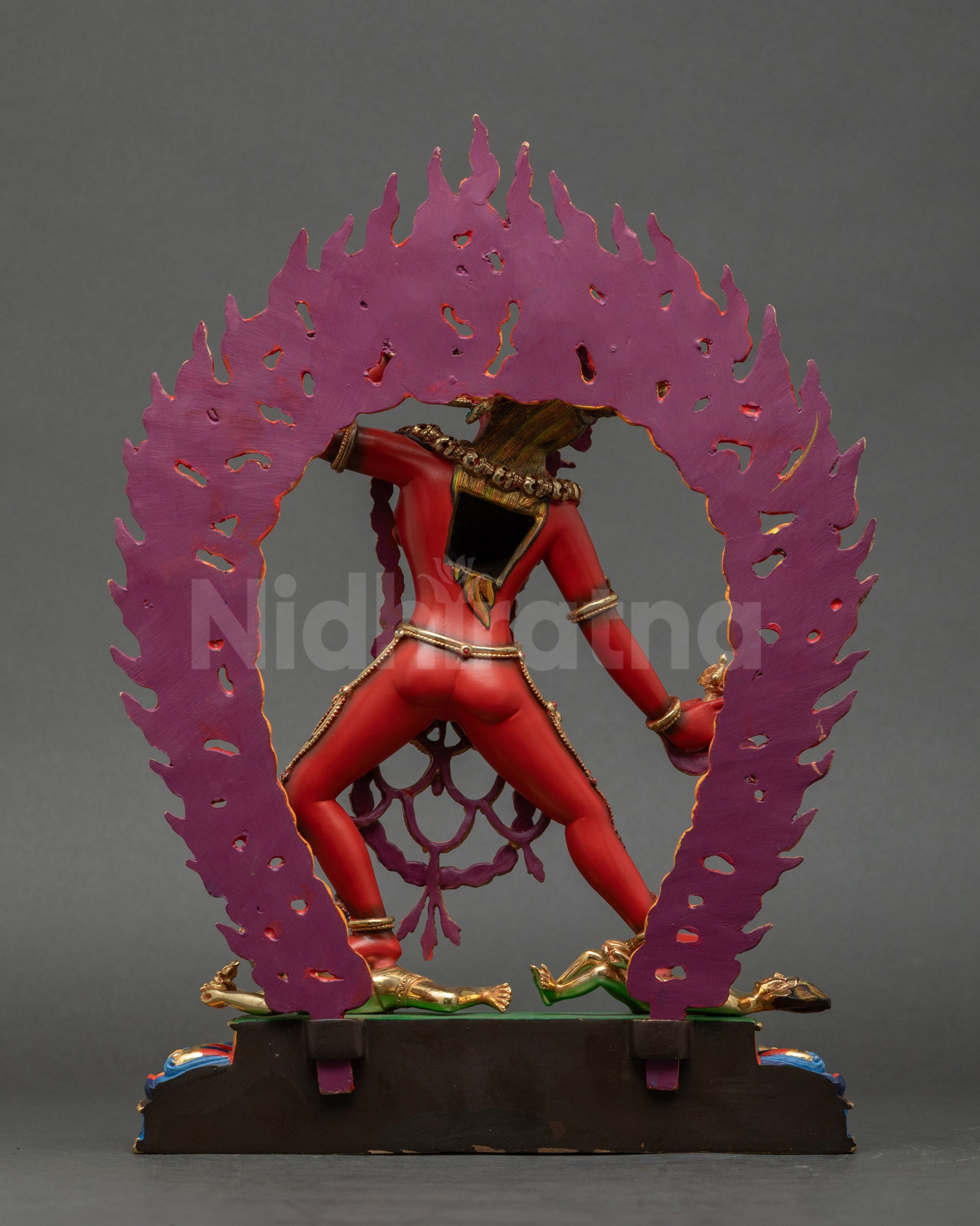 Back view of Vajrayogini Statue revealing detailed robe patterns and flame halo