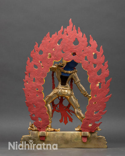 Back view of Vajrayogini statue showing intricately carved robes and tantric symbolism