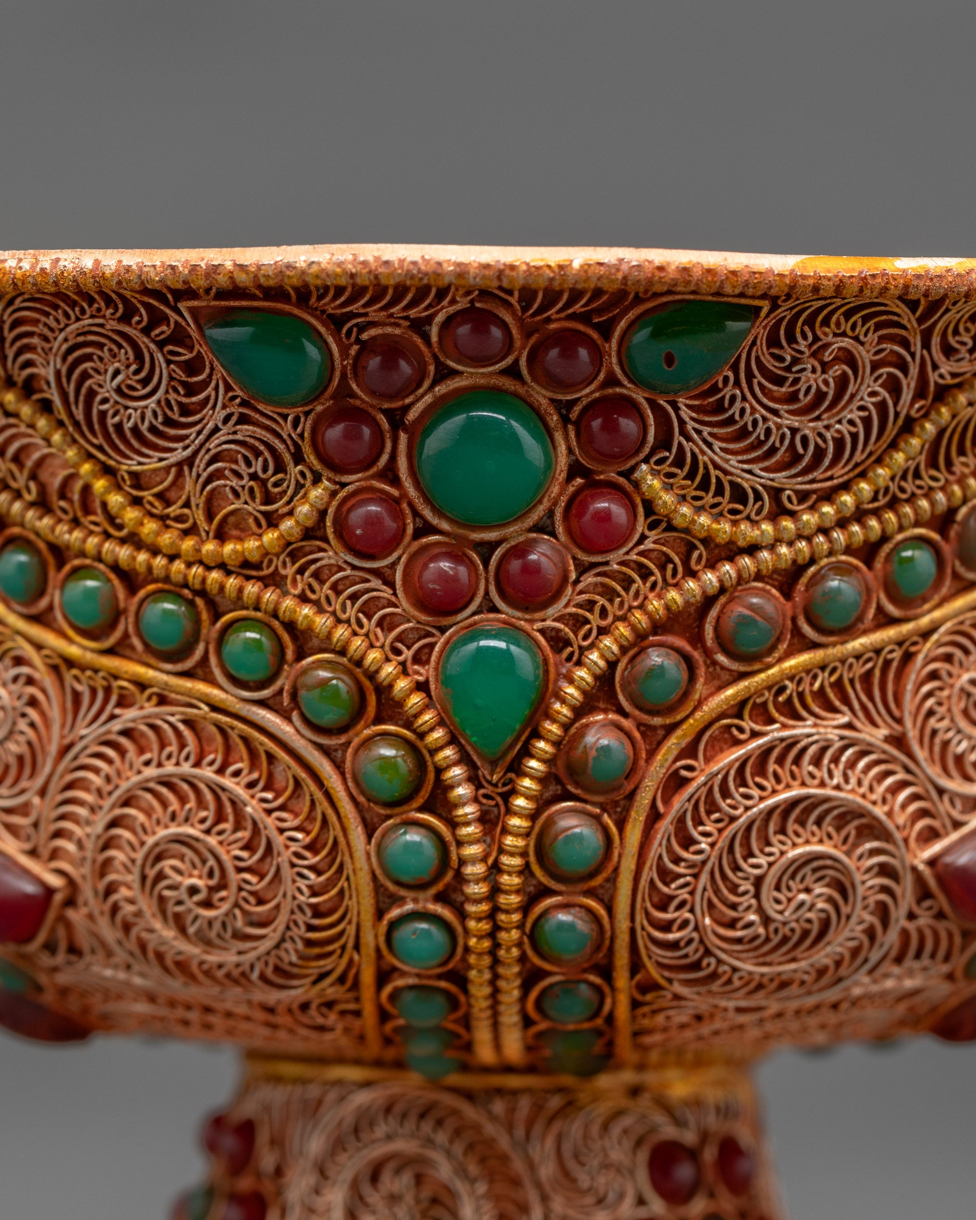 Back view of Water Offering Bowl on altar with silver-plated finish and gemstone accents