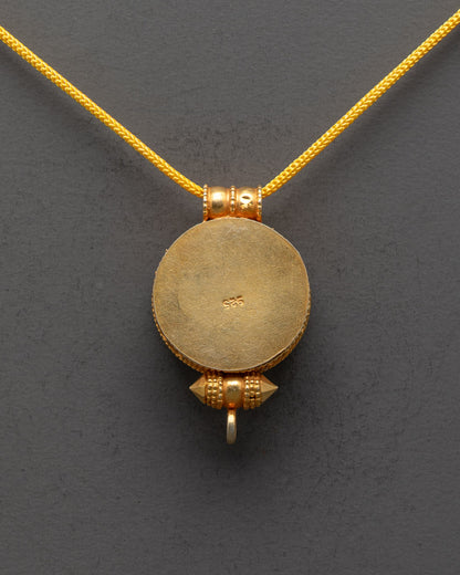 Back view of Wheel of Dharma Locket with unique hand-carved patterns and gold finish