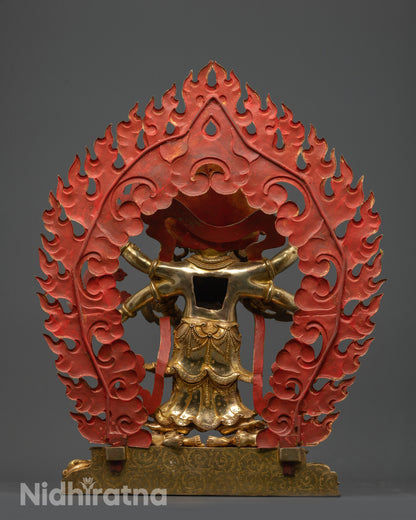 Back view of White Mahakala Statue highlighting detailed halo, flowing robe, and carved lower garments