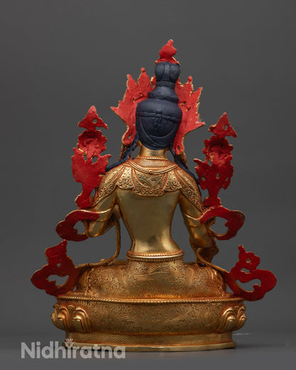 Back view of White Tara Sculpture highlighting gold fire-gilded body and artisan detailing
