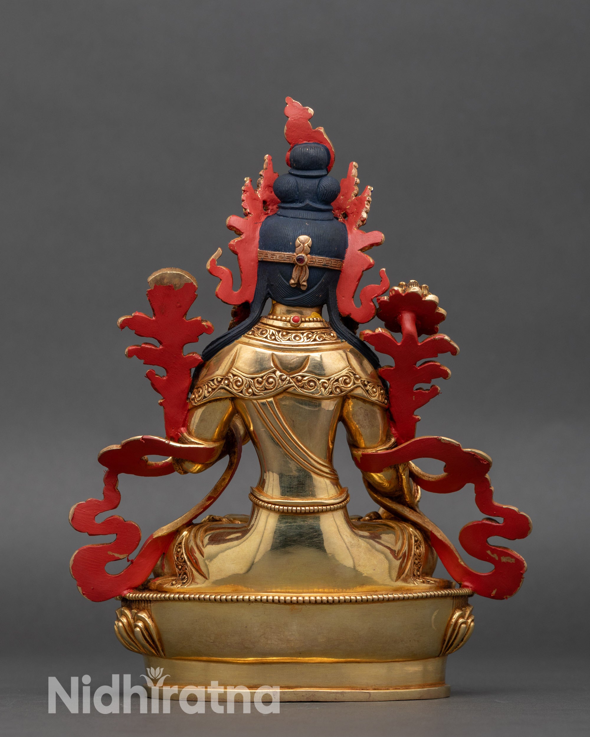 Back view of White Tara Statue, double lotus base and flowing robe craftsmanship