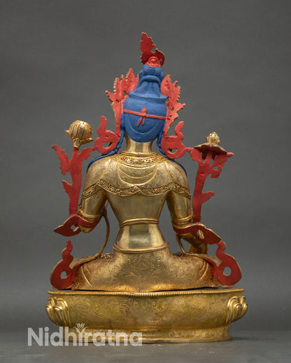 Back view of White Tara Statue highlighting intricate carvings and semi-precious stones