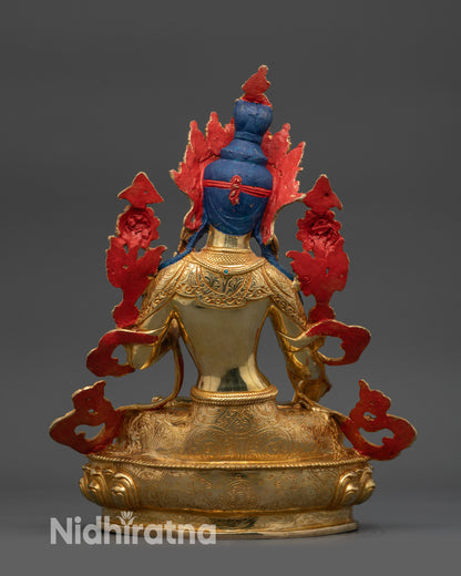 Back view of White Tara statue highlighting carved robe, lotus seat, handcrafted art