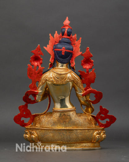 Back view of White Tara statue highlighting detailed lotus throne and gold fire-gilded copper finish