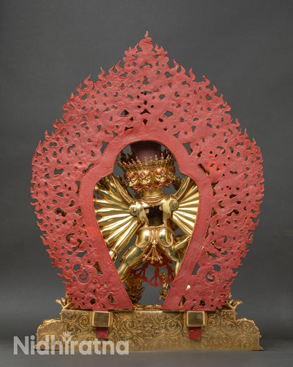 Back view of Yamantaka statue showing flaming halo and detailed sculptural work