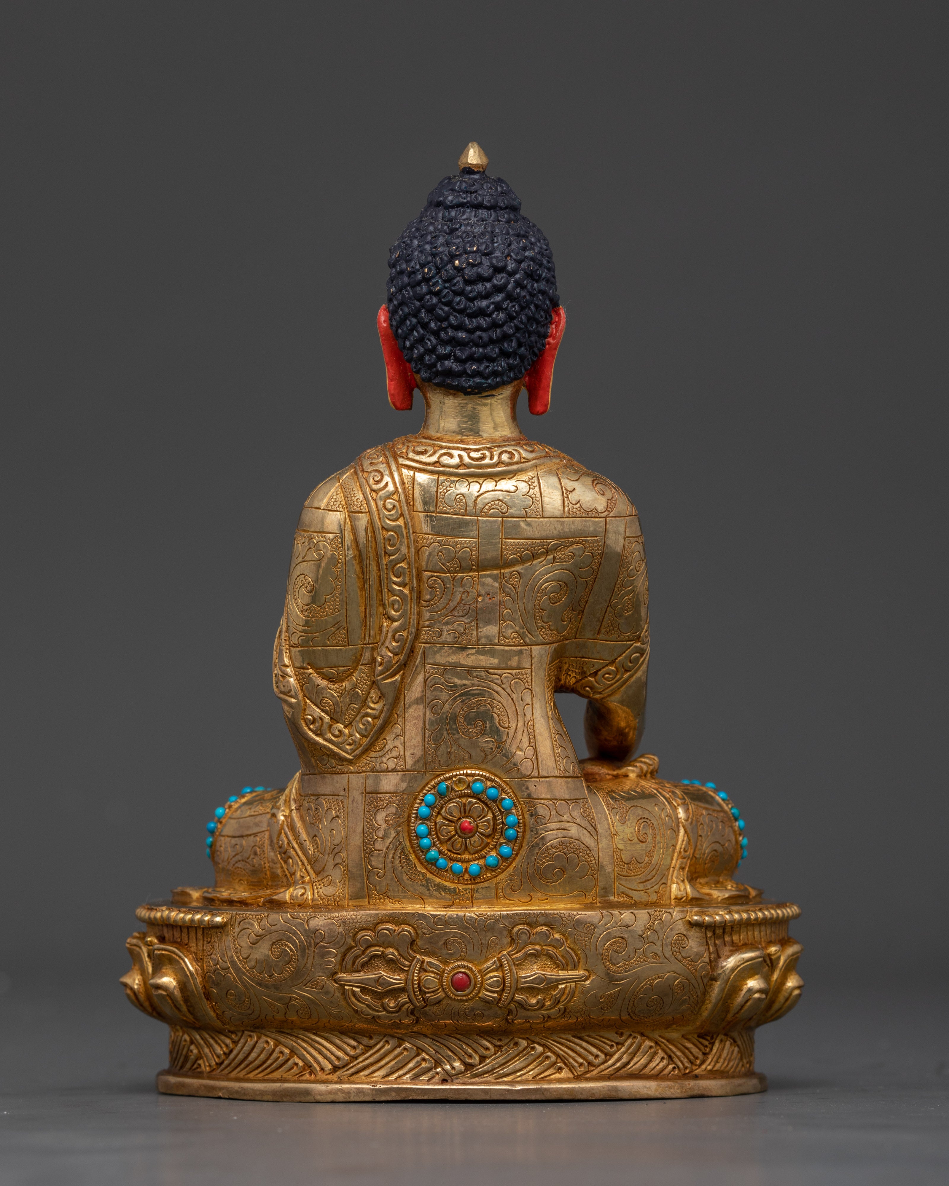 Back view of authentic Sakyamuni Buddha statue showcasing lotus pedestal and artisan craftsmanship