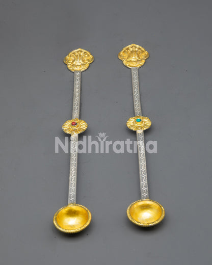 Back view of engraved Conch Shell on Tibetan altar spoon handle