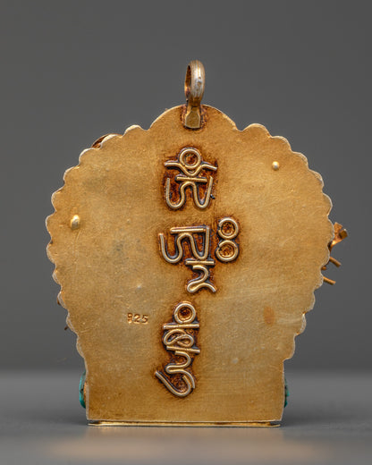 Back view of gold-gilded Ganesha amulet with traditional filigree carving from Patan, Nepal