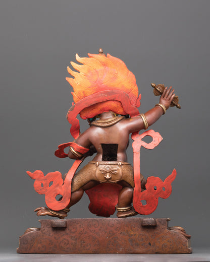Back view of gold-gilded Vajrapani with lotus base and intricate flame details