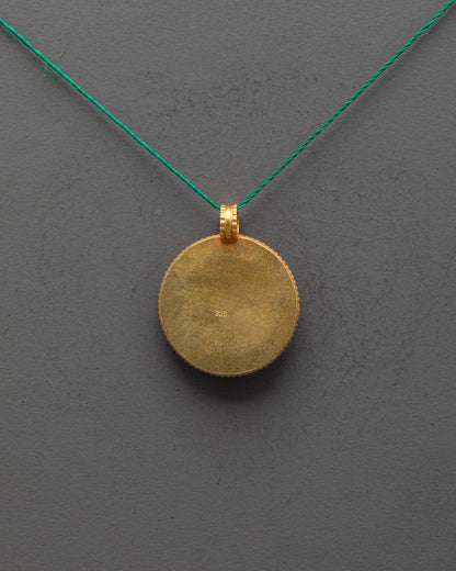Back view of gold-plated copper Victory Banner Pendant highlighting artisan craftsmanship