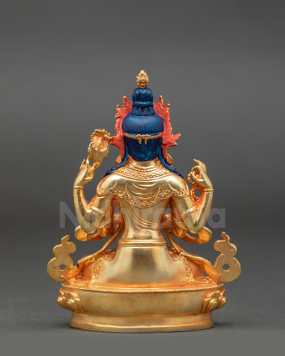 Back view of gold fire-gilded Chenrezig statue adorned with semi-precious stones