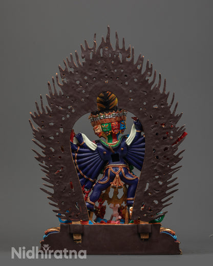 Back view of hand-carved Yamantaka Statue with fierce halo and intricate lotus base