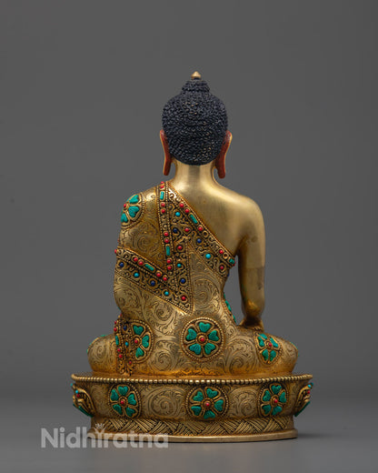 Back view of handcrafted Buddha Shakyamuni statue with turquoise, coral, and lapis stones