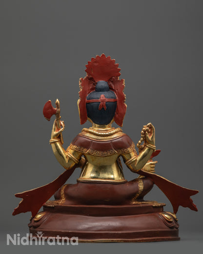 Back view of handcrafted Ganesh statue seated on lotus with calm facial expression
