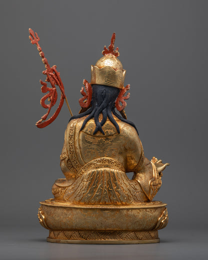 Back view of handcrafted Guru Rinpoche statue with detailed Tripitaka robe and lotus base
