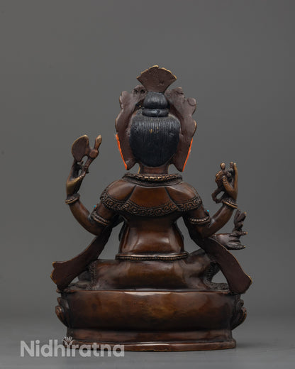 Back view of handcrafted Lord Ganesha statue highlighting rat vehicle and detailed robe
