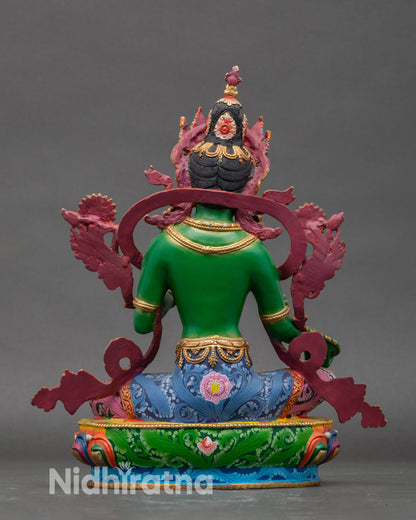 Back view of handcrafted Nepalese Green Tara statue, traditional lotus seat, spiritual home altar decor