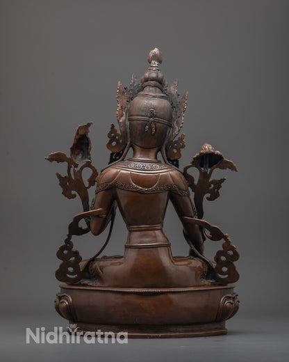 Back view of handcrafted Oxidized White Tara statue with precise lotus seat carvings