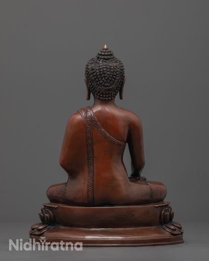 Back view of handcrafted Sacred Shakyamuni Buddha Sculpture highlighting robe folds and textue
