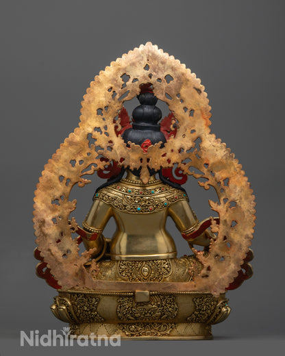 Back view of handmade Dzambhala Statue with lotus base, radiant gold finish