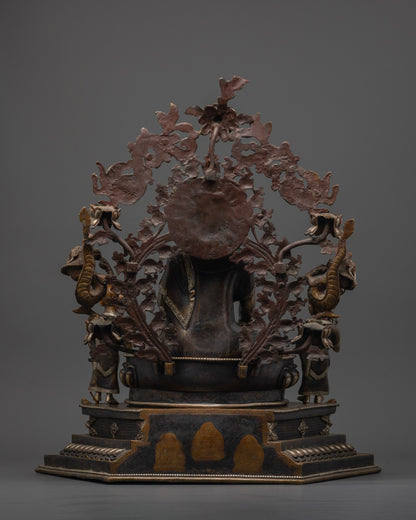 Back view of intricately carved Shakyamuni Buddha sculpture showing hollow chamber