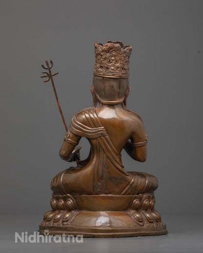 Back view of oxidized Akasagarbha statue highlighting detailed garments and craftsmanship
