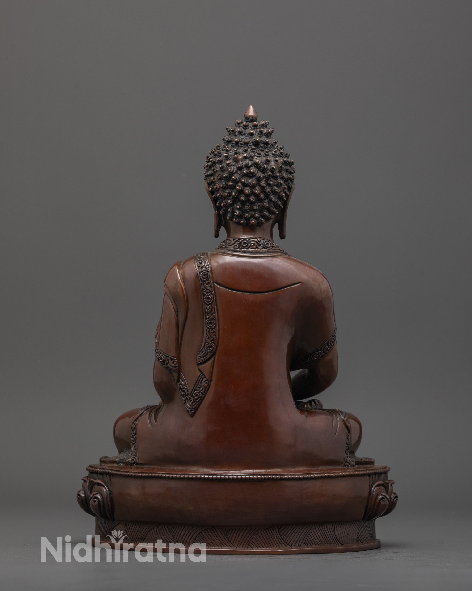 Back view of oxidized Amitabha Buddha statue handcrafted by Nepalese artisan with fine detailing
