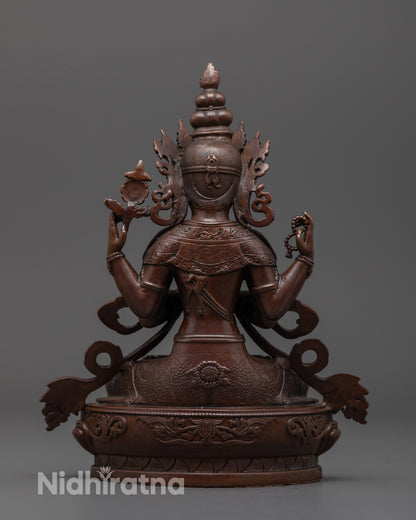 Back view of oxidized Chenrezig statue showing uniform electroplated finish and mantra hollow
