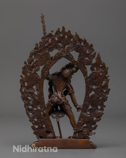 Back view of oxidized Vajrayogini statue highlighting flowing robes and craftsmanship details