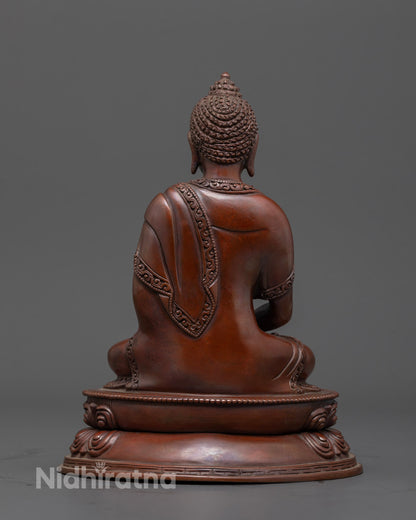 Back view of oxidized copper Amitabha Buddha statue, emphasizing handcrafted patterns